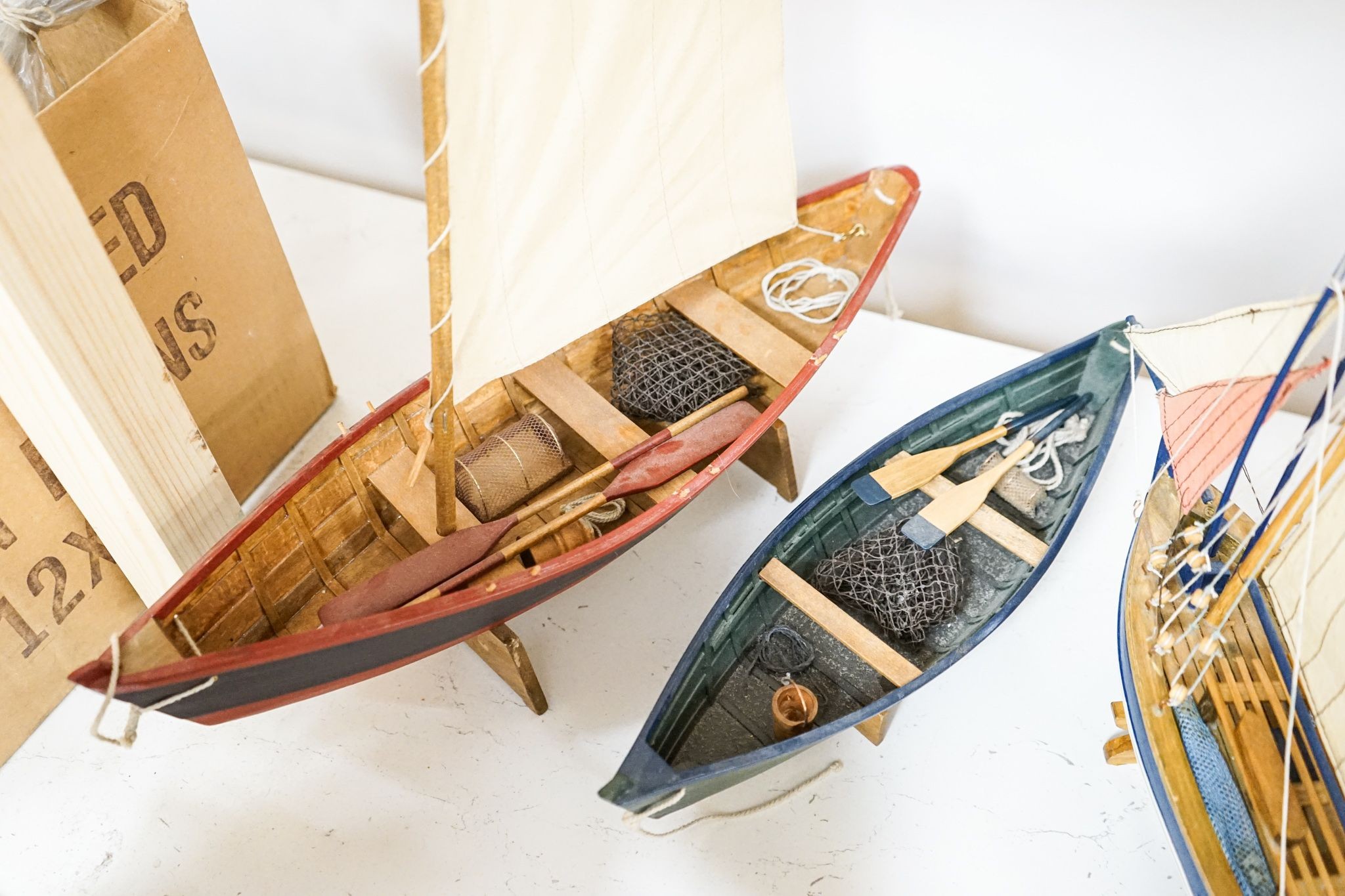A group of six painted wood boat models